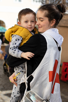 (c)Marko Kokic, IFRC_March 24, 2022 (Uzhhorod, Ukraine). Ukrainian Red Cross volunteers distribute donated clothing and for children and adults as well as toys to IDPs in front of the Red Cross branch ofp-UKR0380.jpg