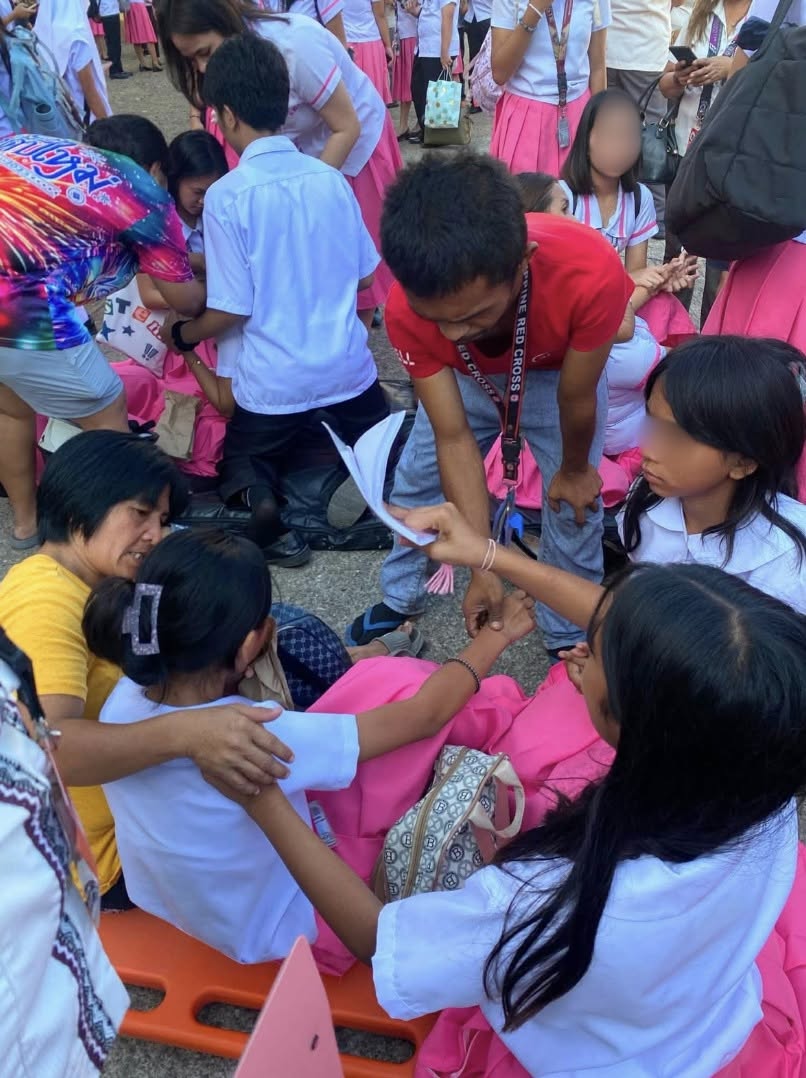 PRC assisting evacuated students.jpg