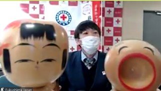 こけしと男子生徒